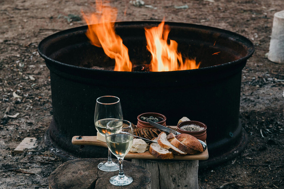 Australian wines served around a campfire. Australian wine subscriptions.